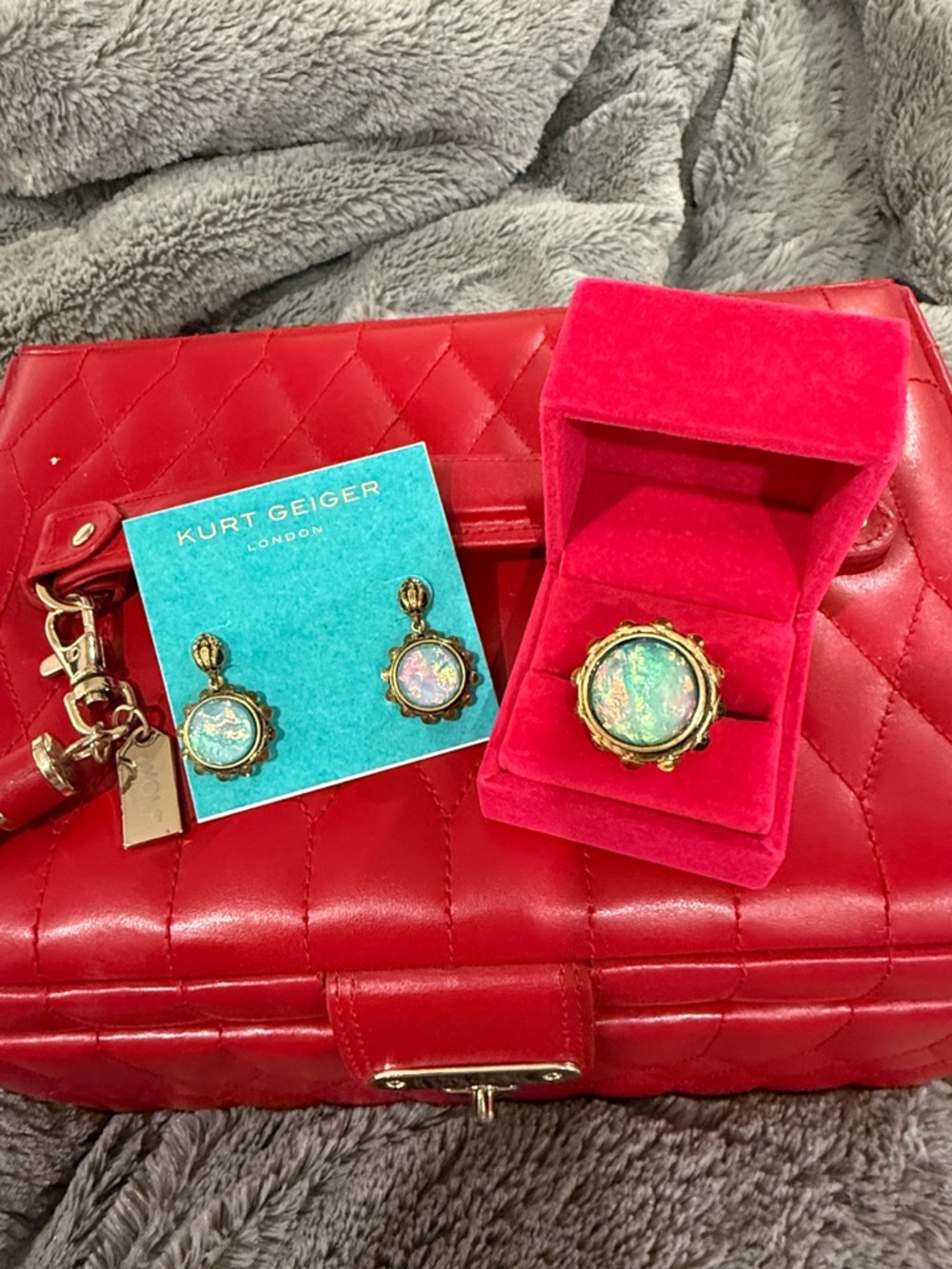 Kurt Geiger Gold-Tone Ring and Earrings with Iridescent Blue-Green Stones